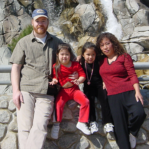 William Robert Stanek with his wife and daughters